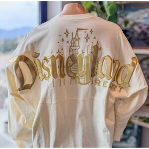 NWT Disneyland Resort Spirit Jersey Cream Gold Castle Long Sleeve Top Womens